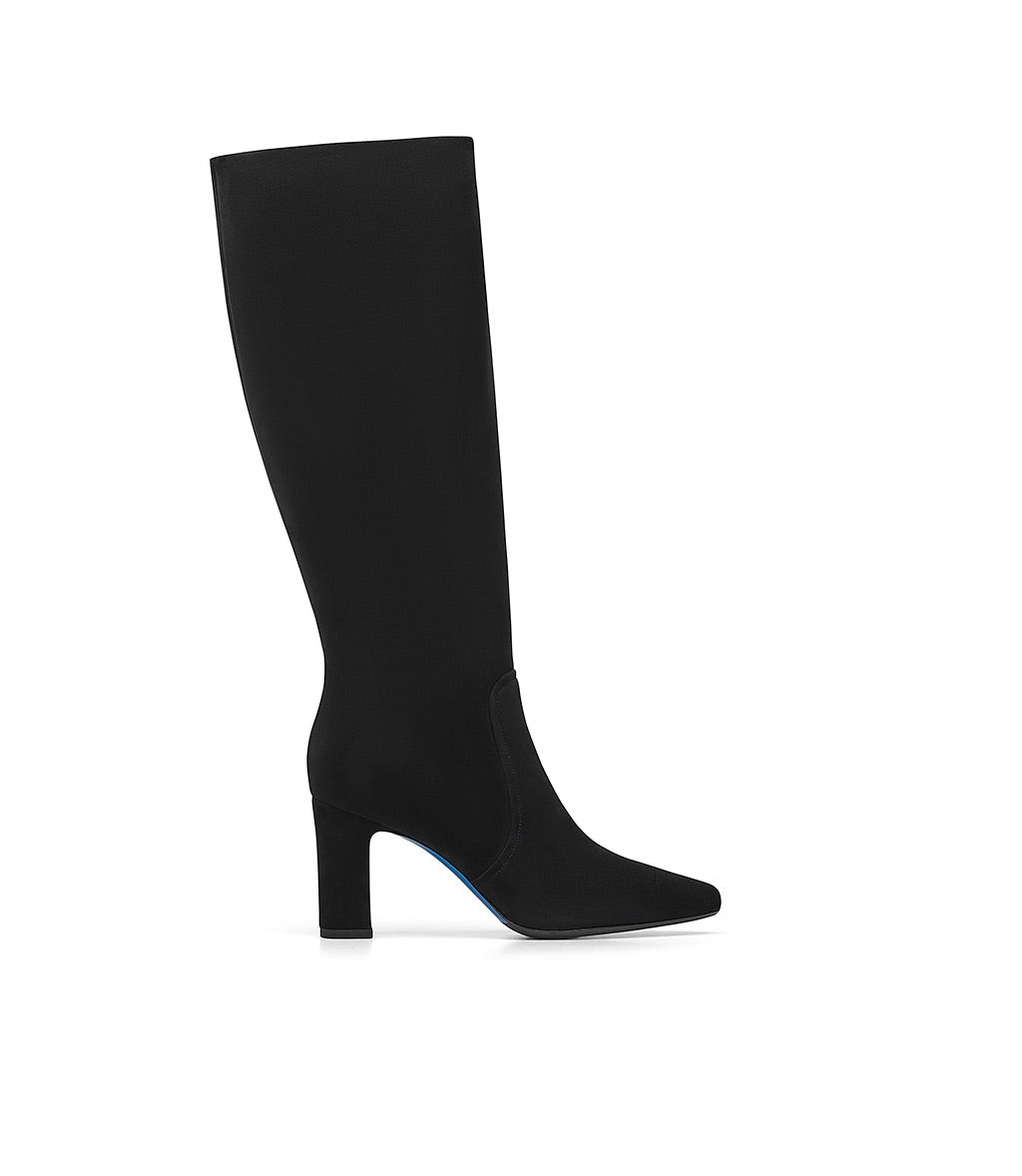 Premium AI Image | Designer heeled boots in black suede